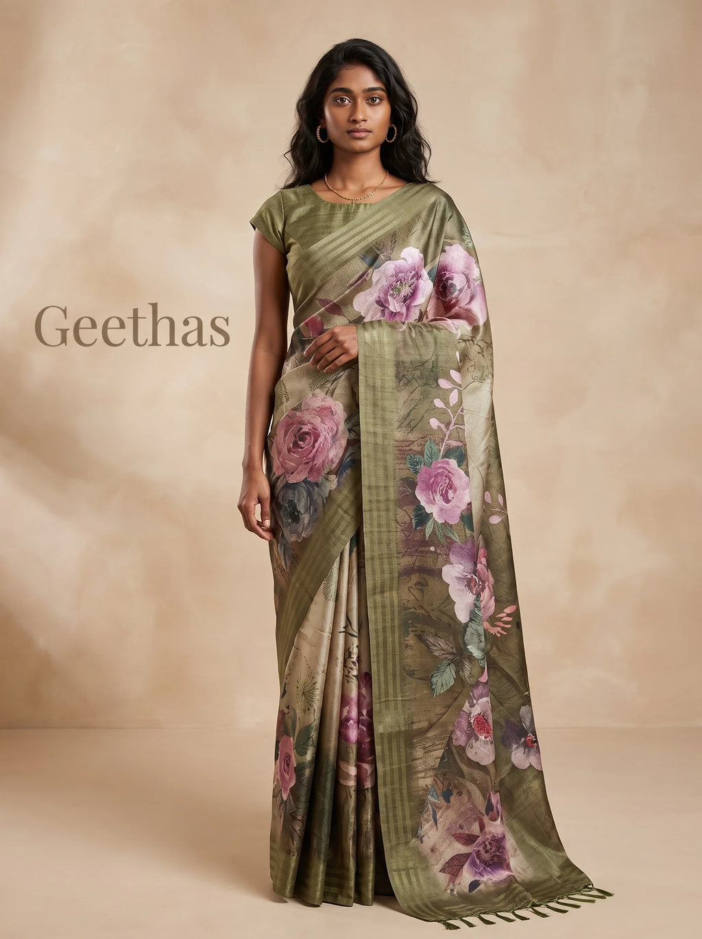 Model wearing an olive green floral printed semi tussar saree with a striped pallu border
