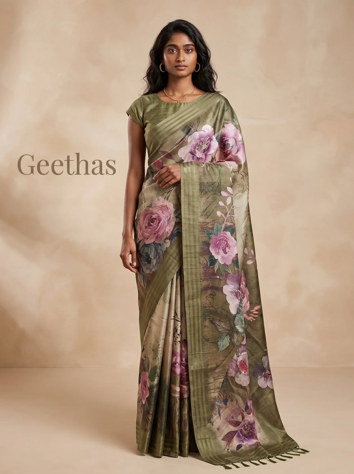 Model wearing an olive green floral printed semi tussar saree with a striped pallu border