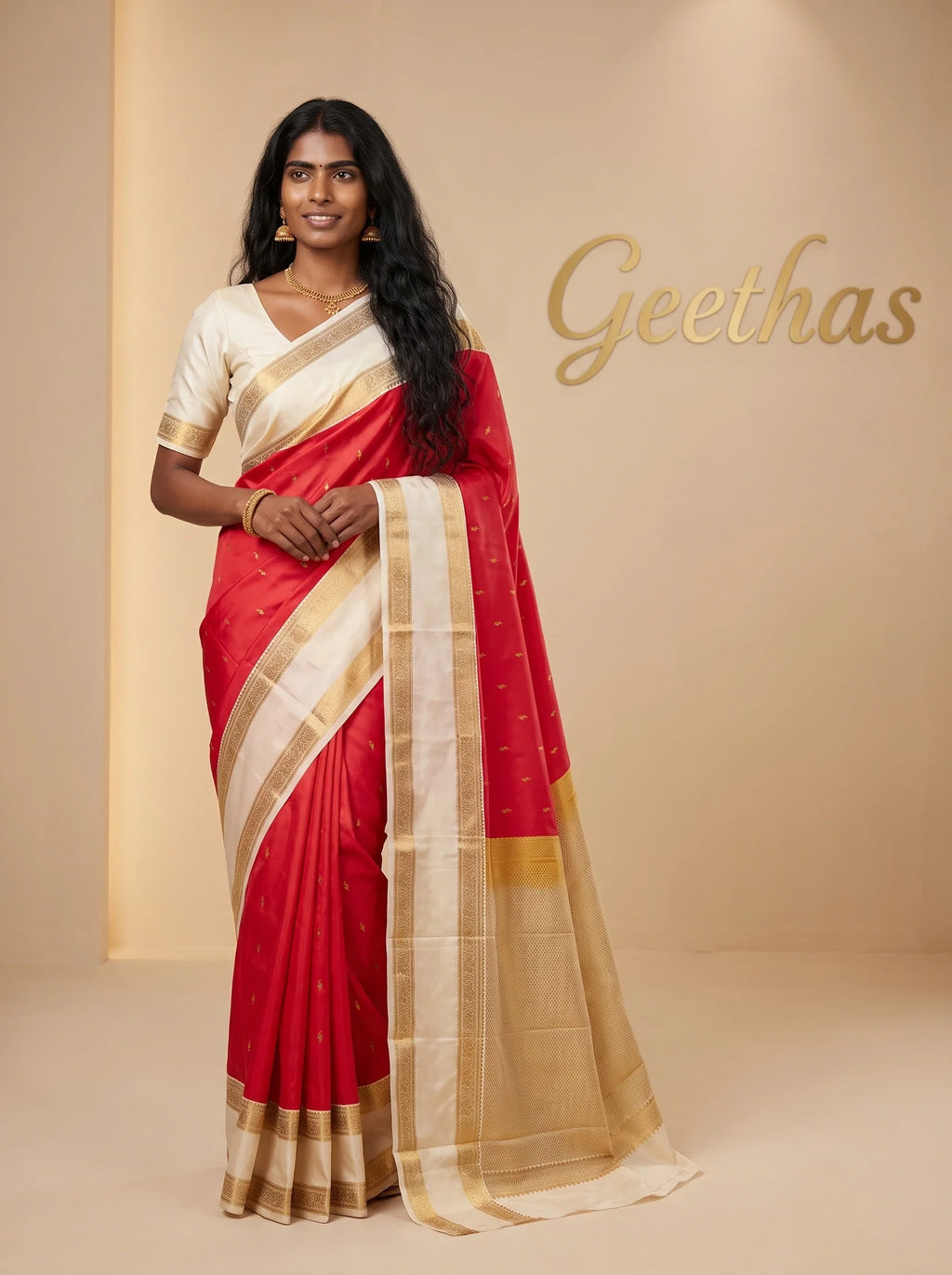 Model wearing a bright pink and ivory soft silk saree with gold-toned woven border